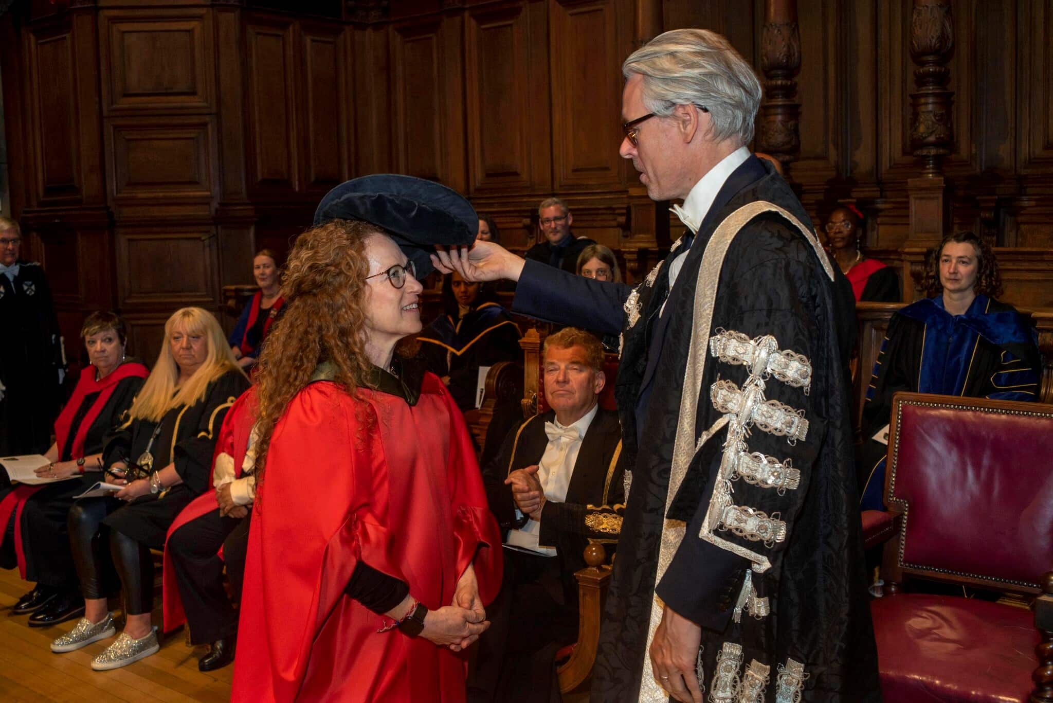 Photo of Justine Cassel, doctorate, being honored by the University of Edinburgh